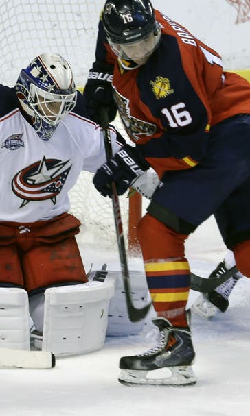 It's McElhinney's net as Forsberg awaits his chance
